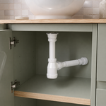 ხელსაბნის სიფონი Metline ბოთლისებრი 32*40სმ B1-LF32 — რეალურ ინტერიერში — სწორად დამონტაჟებული, შესაბამისი ზომით და მშრალი